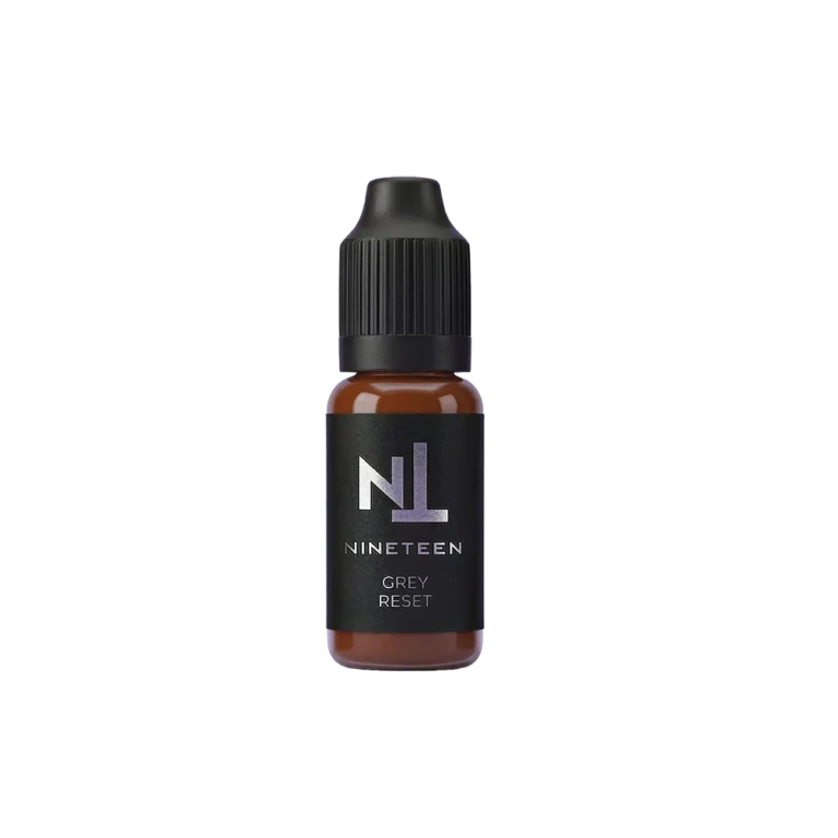 NINETEEN PIGMENTS Grey Reset anti-grey PMU corrector bottle for permanent makeup color modification.