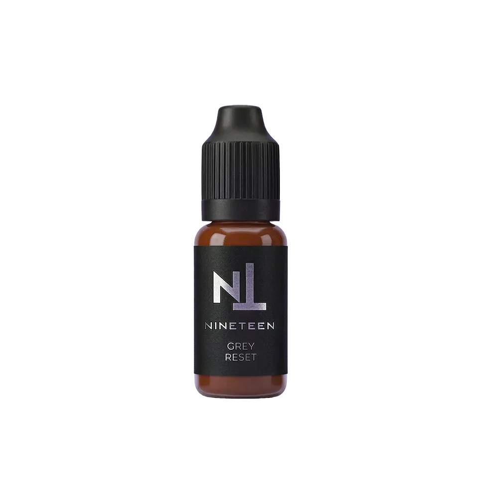 NINETEEN PIGMENTS Grey Reset anti-grey PMU corrector bottle for permanent makeup color modification.