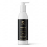 Professional salon-size 200ml bottle of Aesthderm AMIKO Sunscreen SPF 50+ broad-spectrum photoprotector for post-procedure skin defense.